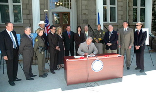 http://www.stopthedrugwar.org/files/dumb-bill-signing.jpg