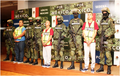 Mexican military displaying detainees (sedena.gob.mx)