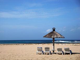 The beach at Bali. Indonesia is a major tourist destination, but also has the death penalty for drug offenses. (wikimedia.org)