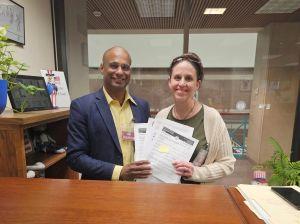 Missouri activists Eapen Thampy and Deb Nash hand in initiative petitions in Jefferson City. (Missourians for a Single Market)