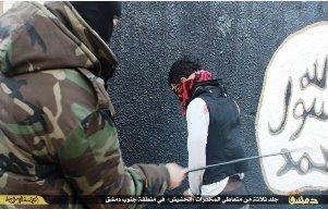 ISIS imposes rough justice on a drug user in Raqqa, Syria. (twitter.com)