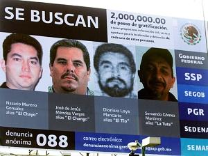 La Familia wanted billboard, "El Chayo" on left